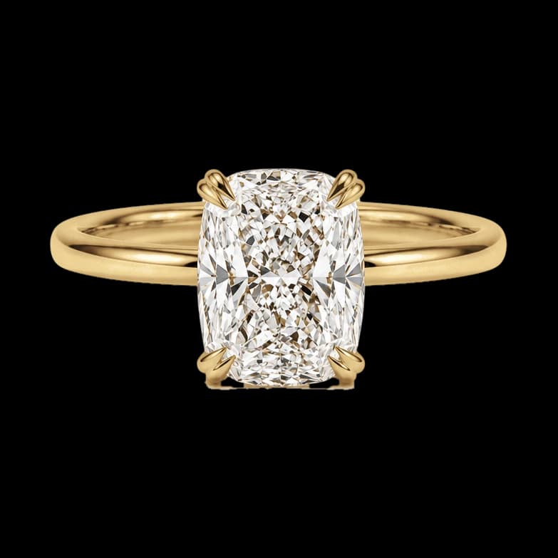 Yellow gold cushion solitaire ring