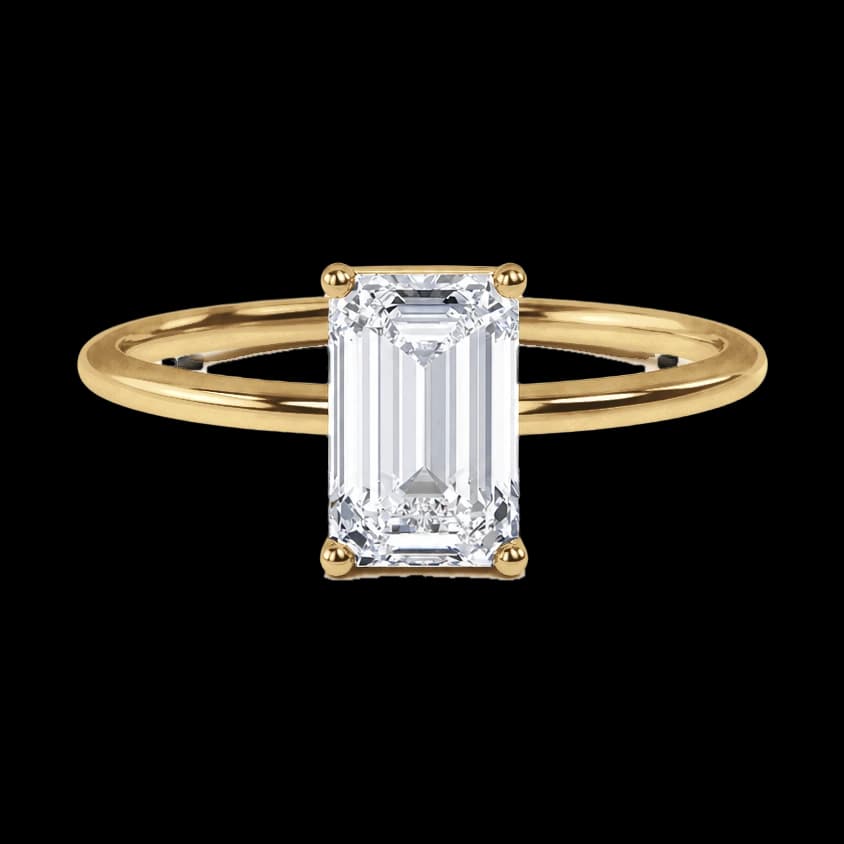 Emerald solitaire engagement ring