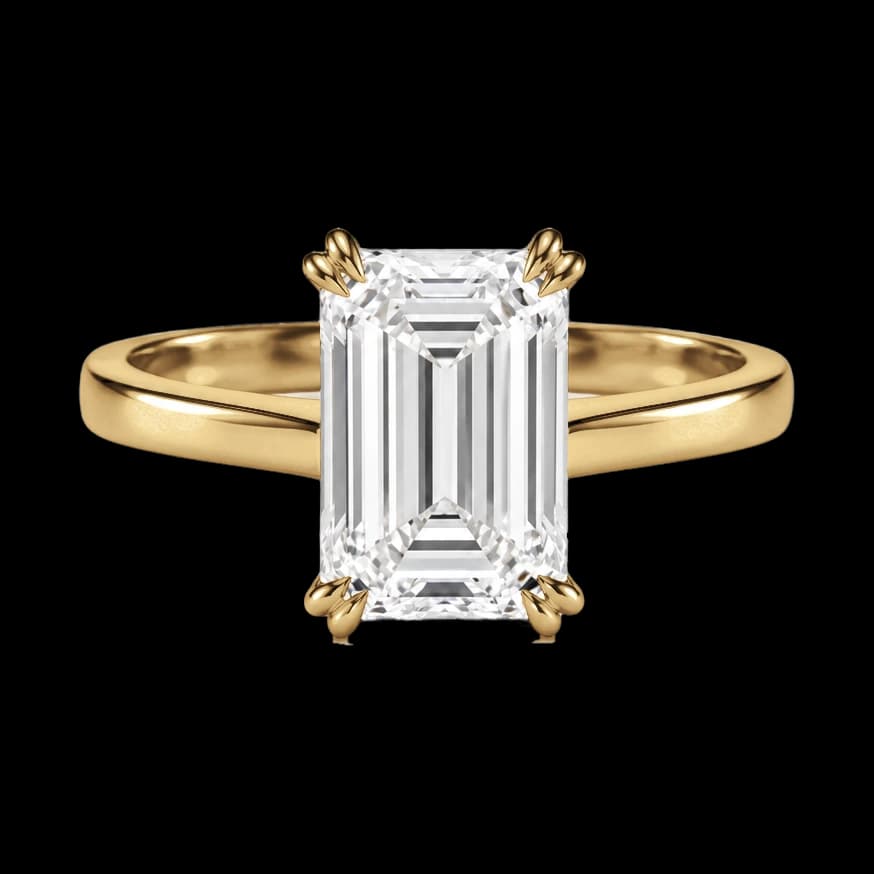Emerald solitaire engagement ring