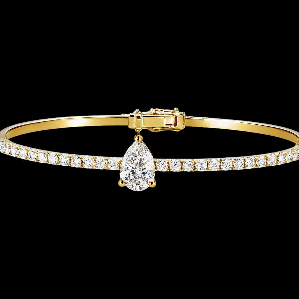 Pear diamond tennis bangle, yellow gold