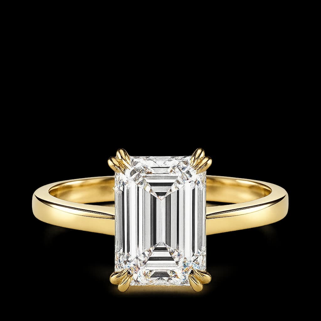 Emerald solitaire engagement ring