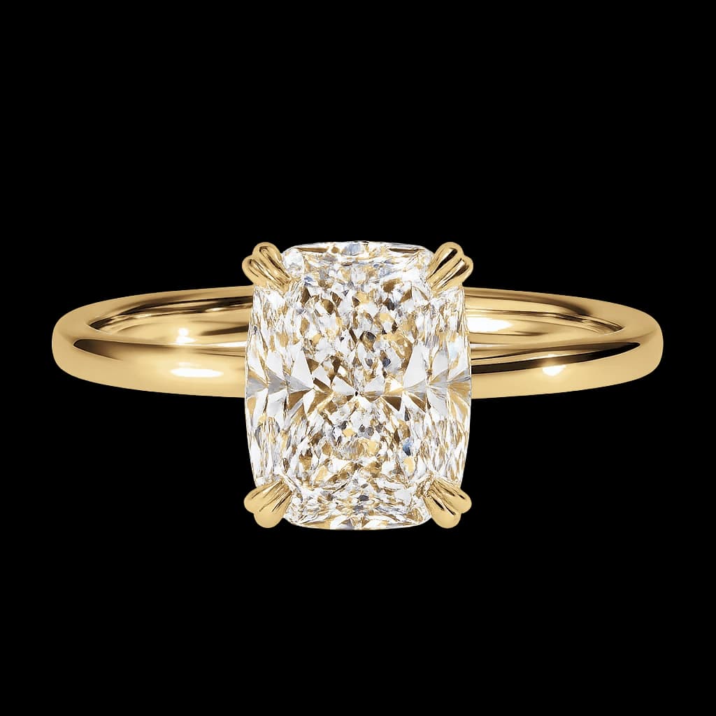 Yellow gold cushion solitaire ring