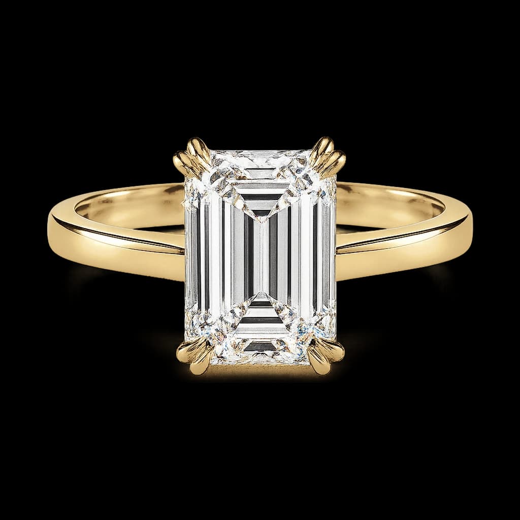 Emerald solitaire engagement ring